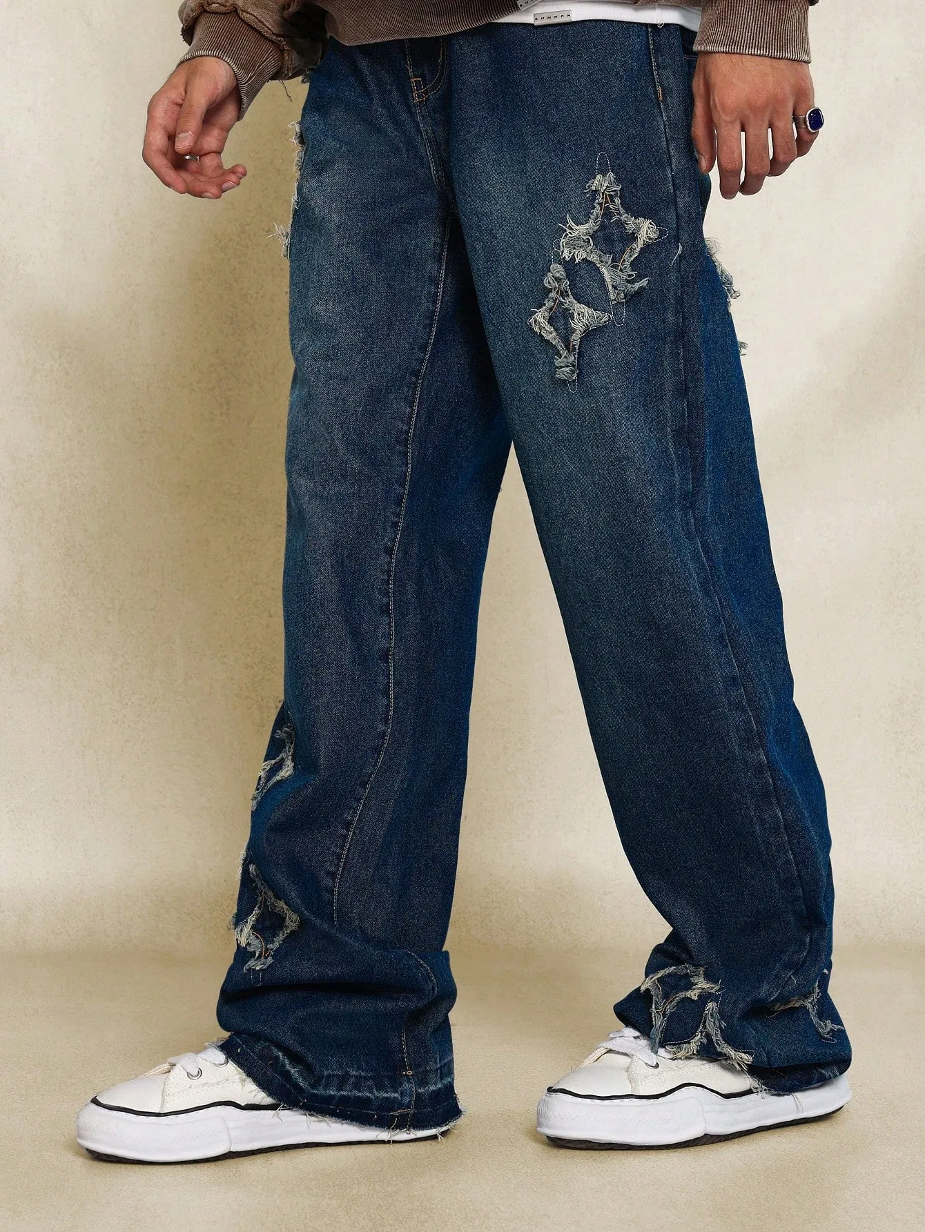 Flare Fit Distressed Raw Edge Jean